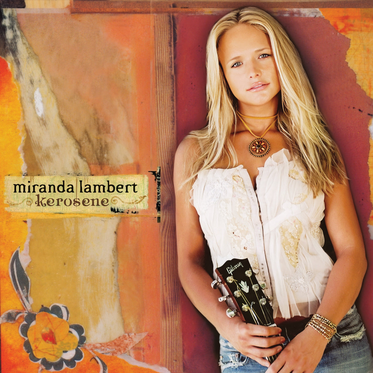 Album cover for Miranda Lambert’s “Kerosene” featuring her with a guitar.