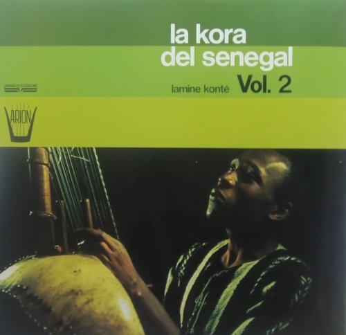 Vinyl record cover: musician playing a kora, green and black background.