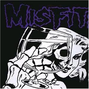 Black and white album cover featuring a skeletal hand holding a wine glass.