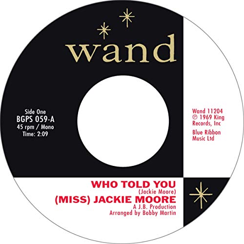 Black and gold vinyl record label with “(miss) Jackie Moore” text.