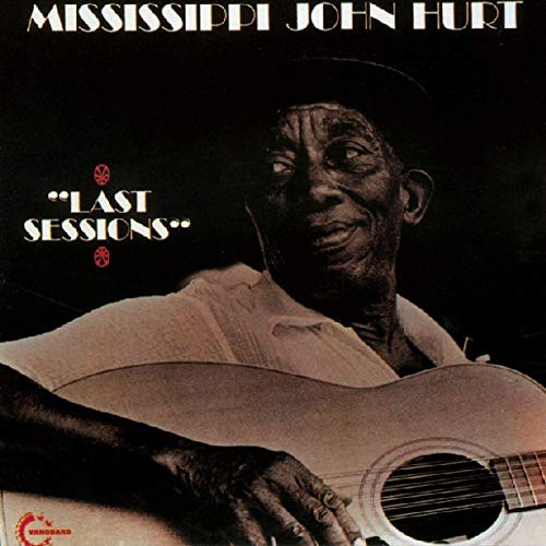 Mississippi John Hurt album cover, portrait of a man with a guitar.