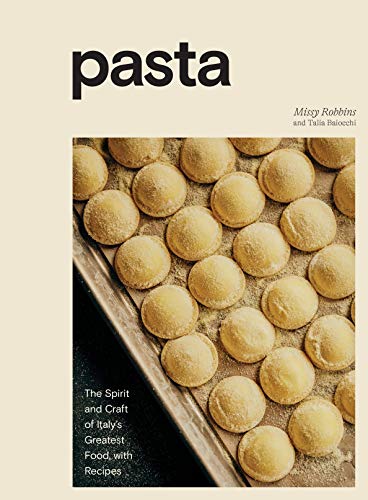 Cookbook cover featuring rows of round, flour-dusted pasta on a baking sheet.