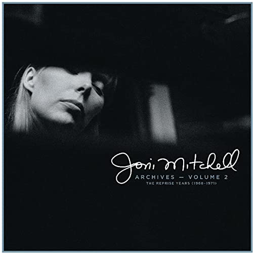 Black and white portrait of Joni Mitchell with album title text.