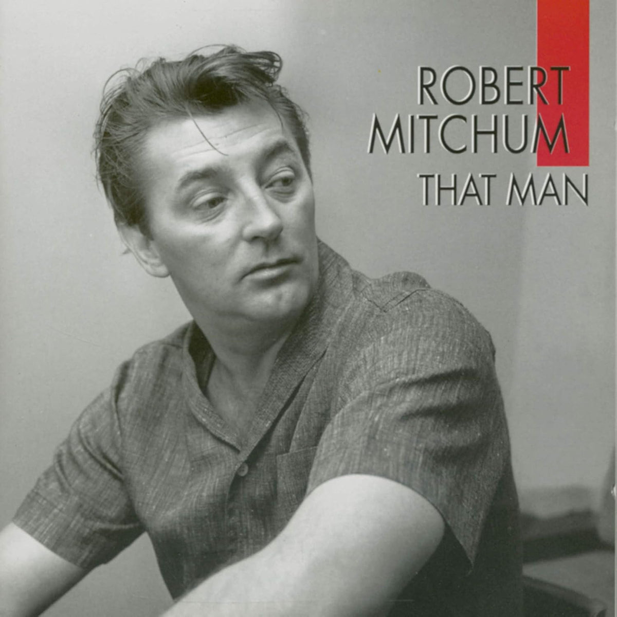 Robert Mitchum portrait on CD cover, titled "That Man".