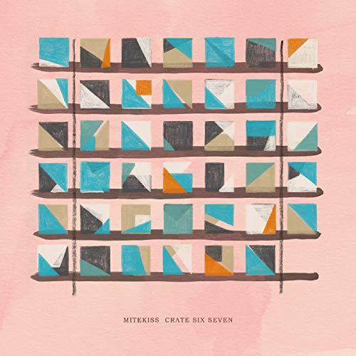 The image shows a pink album cover with shelves holding geometric boxes. alt text: Pink album cover with shelves of colorful geometric boxes.