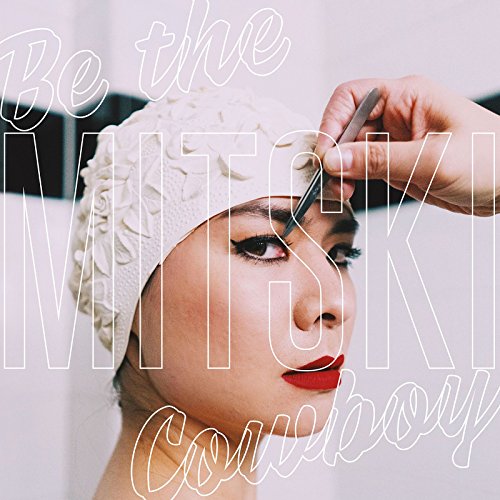 Mitski album cover: woman in swim cap getting eyebrows tweezed.