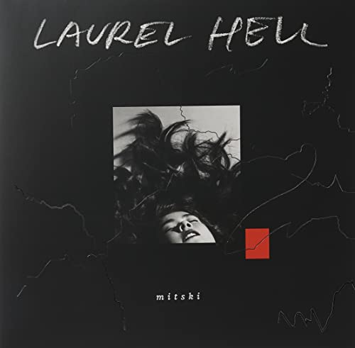 Mitski’s “Laurel Hell” vinyl cover: black background, woman with hair obscuring face.