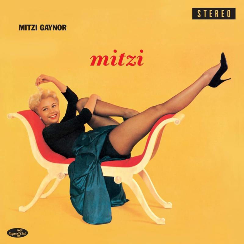 Mitzi Gaynor album cover: a blonde woman reclining on a yellow chair.