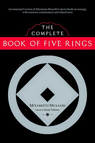 Book cover titled The Complete Book of Five Rings with a large circular emblem.