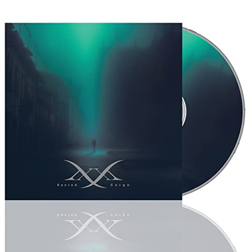 CD case for Mmxx - Sacred Cargo, featuring a lone figure in mist.