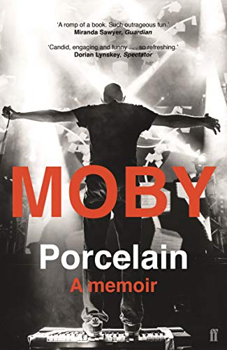 Book cover showing Moby standing on stage with arms outstretched before a bright spotlight.