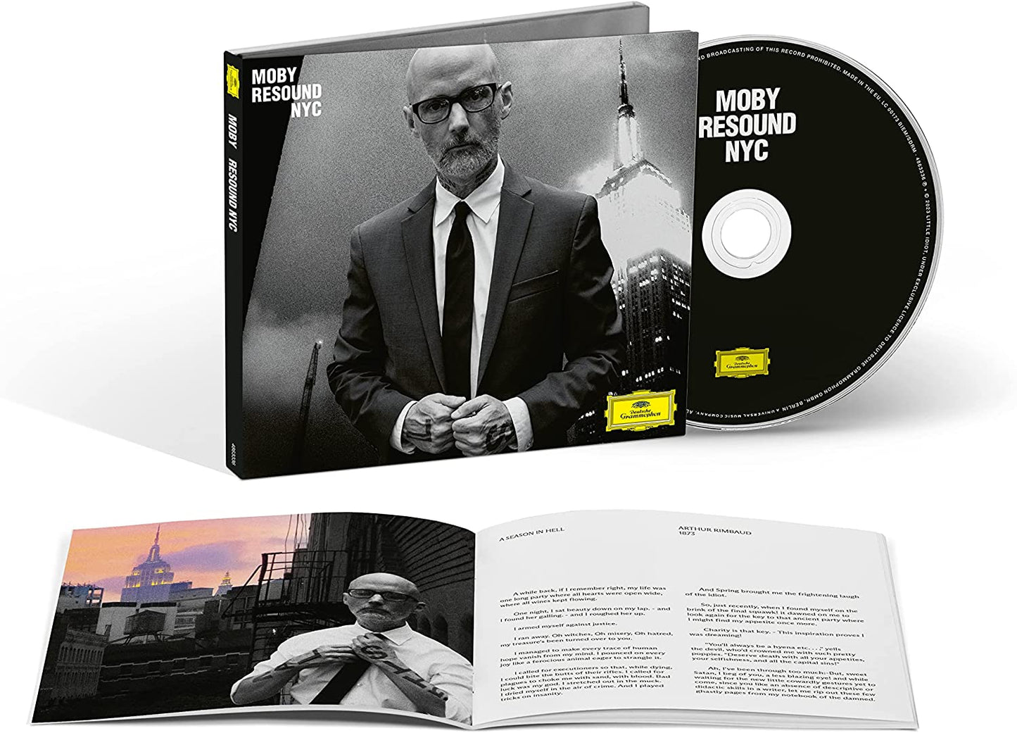 "Moby-Resound NYC" CD with black and white cover, disc, and booklet featuring Moby.