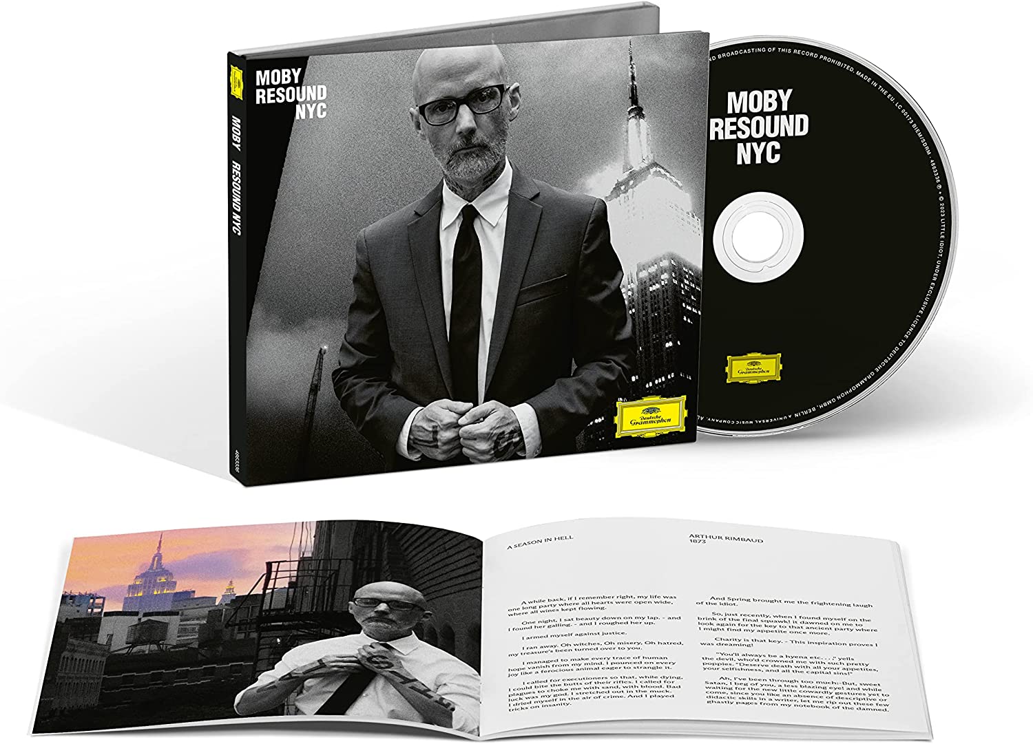 "Moby-Resound NYC" CD with black and white cover, disc, and booklet featuring Moby.