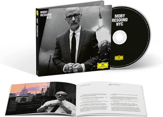 "Moby-Resound NYC" CD with black and white cover, disc, and booklet featuring Moby.