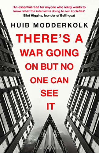 Book cover: red text on grayscale image of modern buildings.