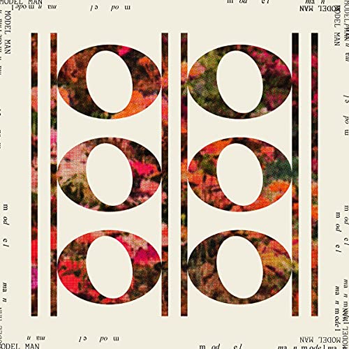 LP record cover with repeating circular, textured patterns in red and black.