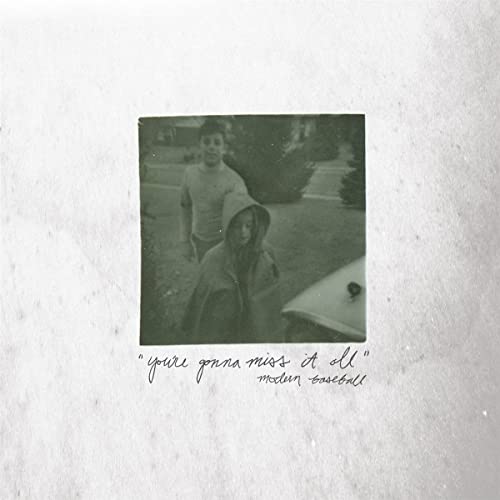 CD cover: black and white photo of two people, text “you’re gonna miss it all”.