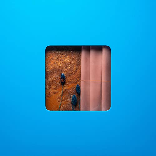 Blue background with a central square showing rusty metal, pink fabric, and blue flowers.