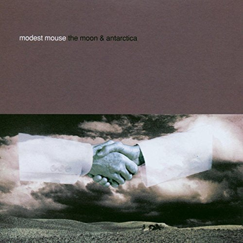 "Album cover with two hands shaking, against a cloudy sky and landscape."
