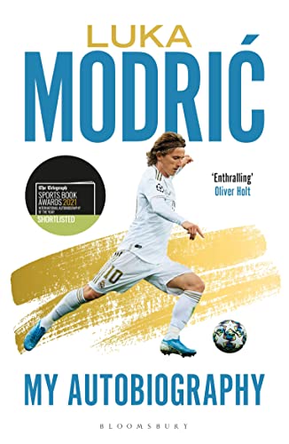 Book cover featuring Luka Modric in a white soccer kit kicking a ball.