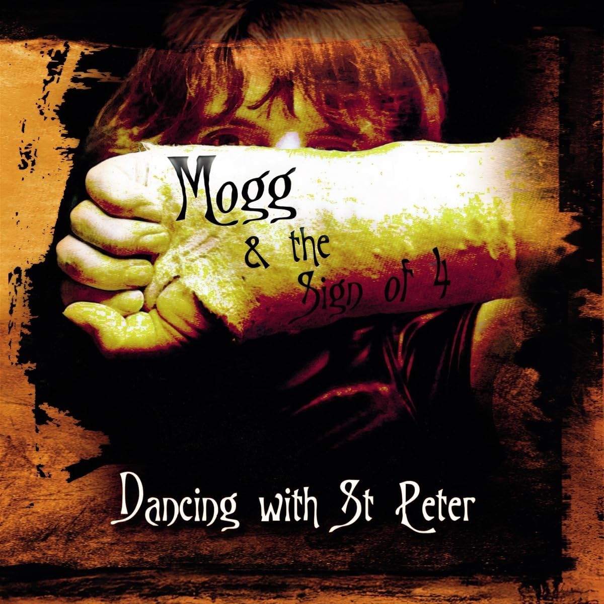 Vinyl record cover featuring a stylized portrait of Phil Mogg against a dark background.