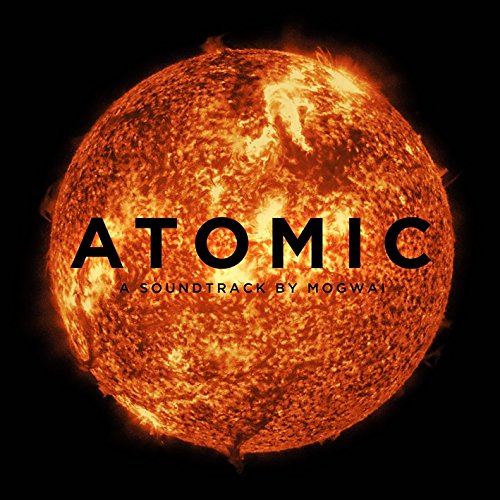 A glowing sun against a black background with the text ATOMIC A SOUNDTRACK BY MOGWAI.