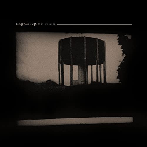 Black and white album cover featuring a water tower in a field.