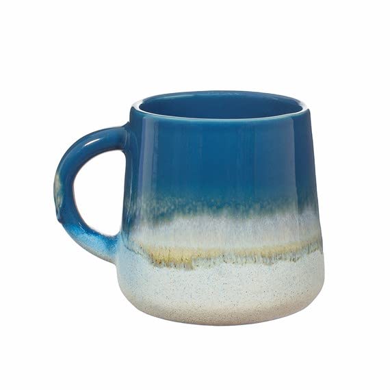 Blue and white glazed ceramic mug with a rounded handle.