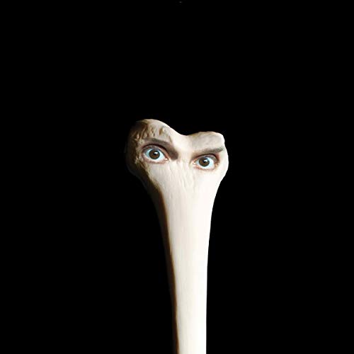 CD cover: pale, sculpted face with large eyes against black background.