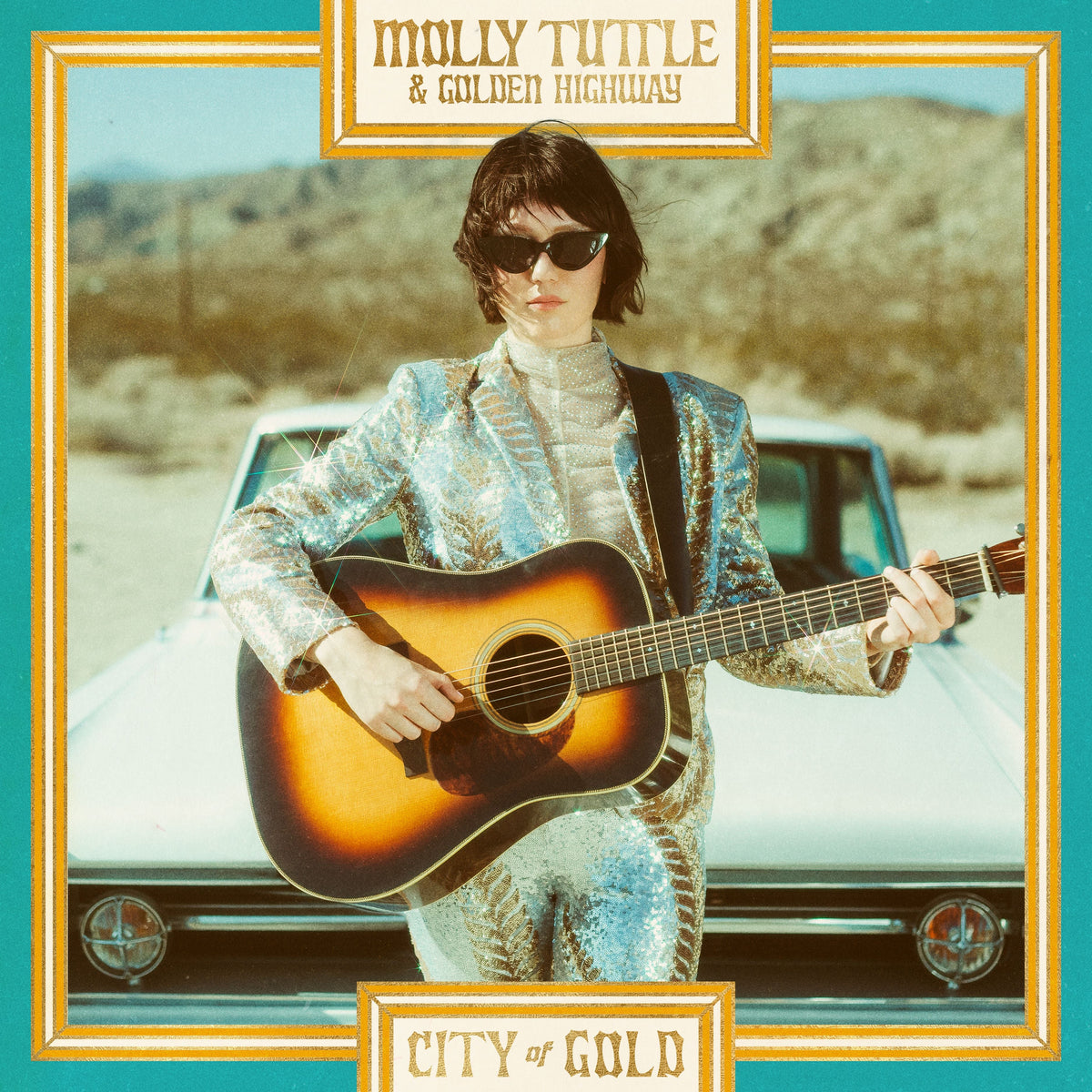 "Album cover featuring a woman holding a guitar in front of a white car."