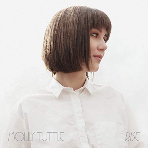 Molly Tuttle with a brown bob haircut wearing a white shirt against white background.