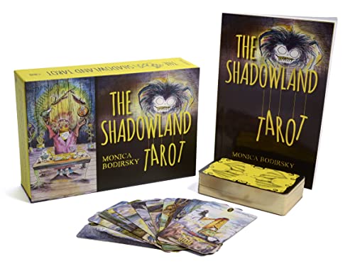 Shadowland Tarot box, cards, and wooden holder with a furry monster illustration.