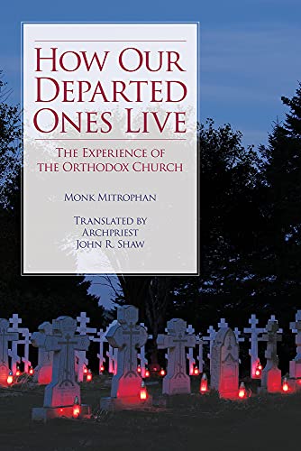 Book cover with title and image of a cemetery with lit candles.