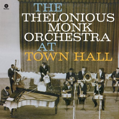 Thelonious Monk Orchestra album cover featuring musicians in suits onstage.