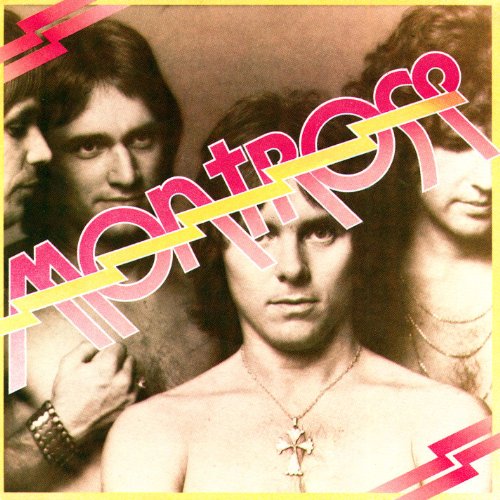 1970s album cover featuring four men and bold pink and yellow text.