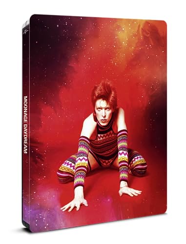 David Bowie crouches in a patterned outfit against a vibrant, star-filled red nebula background.