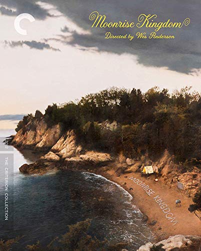 Blu-ray cover art featuring a rocky beach, a small yellow tent, and cloudy sky.