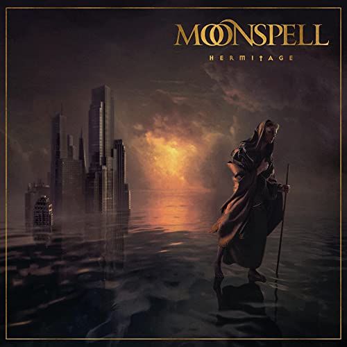 Moonspell album cover: hooded figure before a city in flames.