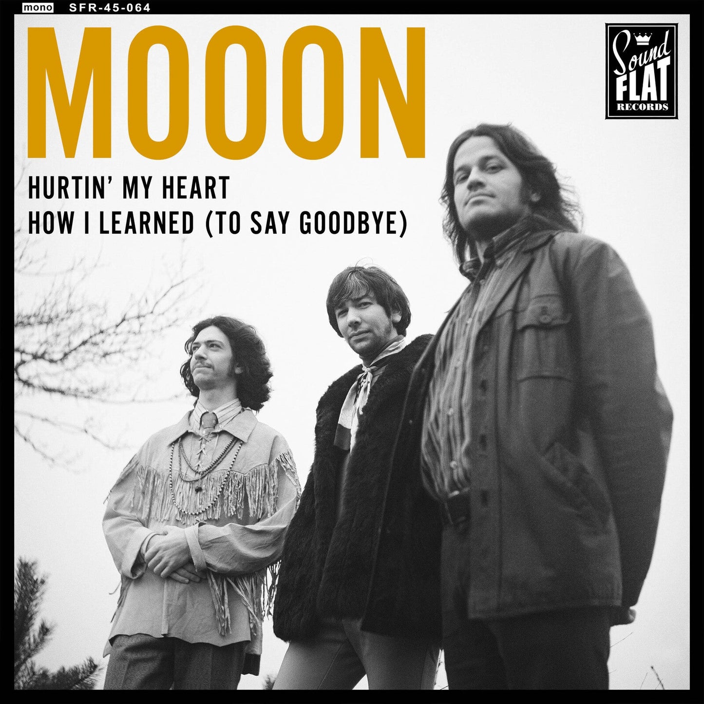 Black and white album cover for Mooon’s “Hurtin My Heart” featuring three men.
