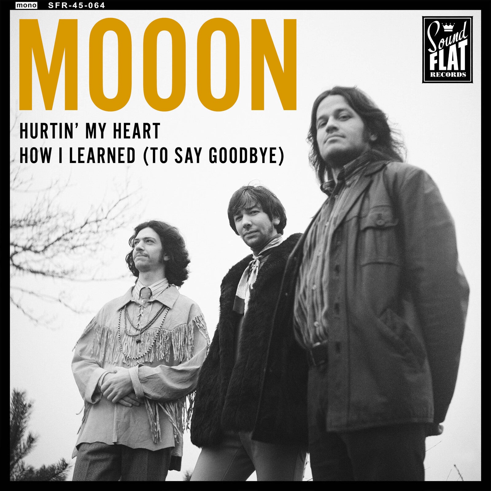 Black and white album cover for Mooon’s “Hurtin My Heart” featuring three men.