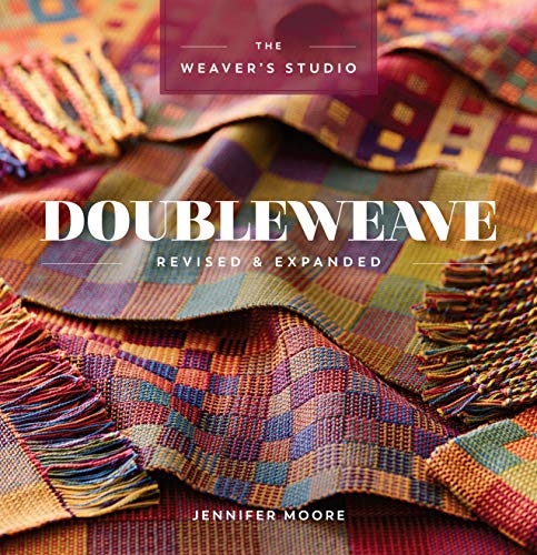 Book cover featuring colorful, checkered woven fabric with fringe and white text overlay.