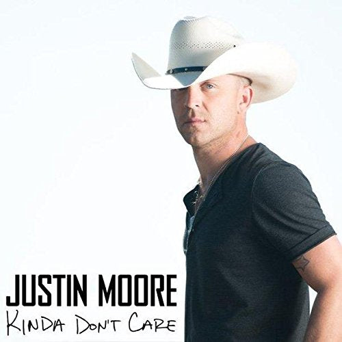 Man wearing a white cowboy hat and black shirt, album cover for "Kinda Don't Care".