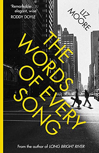 Book cover: “The Words of Every Song” by Liz Moore, city background.