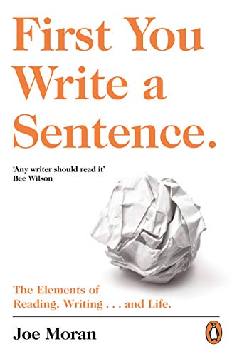 Book cover with orange title text and a crumpled paper ball on white background.