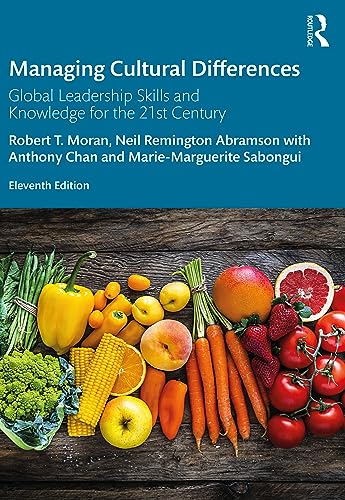 Book cover with title and diverse produce arranged on a wood surface.