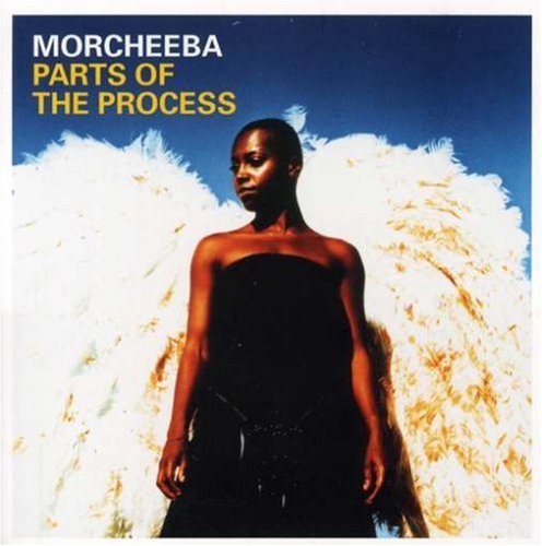 Album cover showing a woman with large white angel wings against a blue sky.