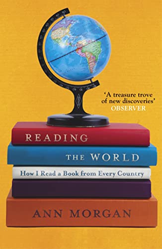 Book stack with a globe on top, titled "Reading the World" by Ann Morgan.