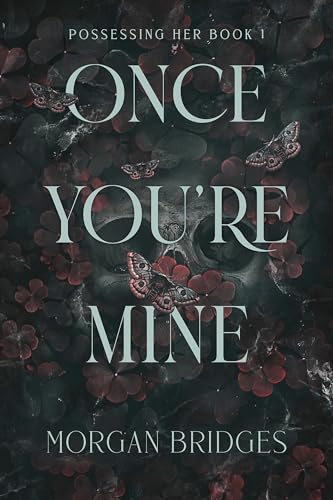 Book cover: dark floral background with large white title “Once You’re Mine”.