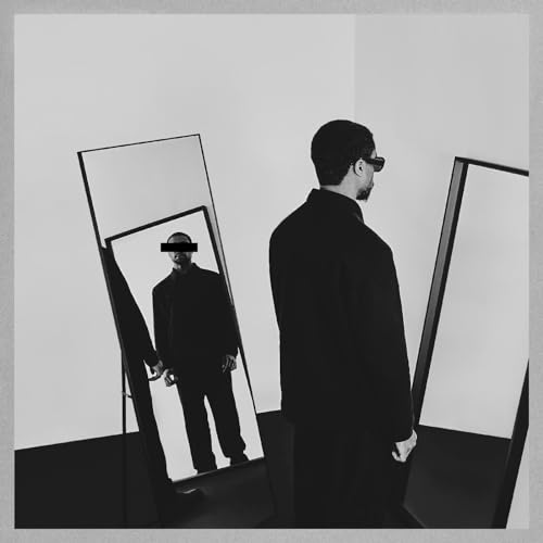 Black and white album cover featuring a man and distorted mirror reflection.