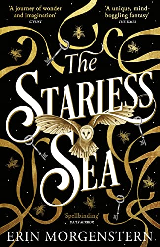 Book cover: “The Starless Sea” with ornate gold design and a white owl.